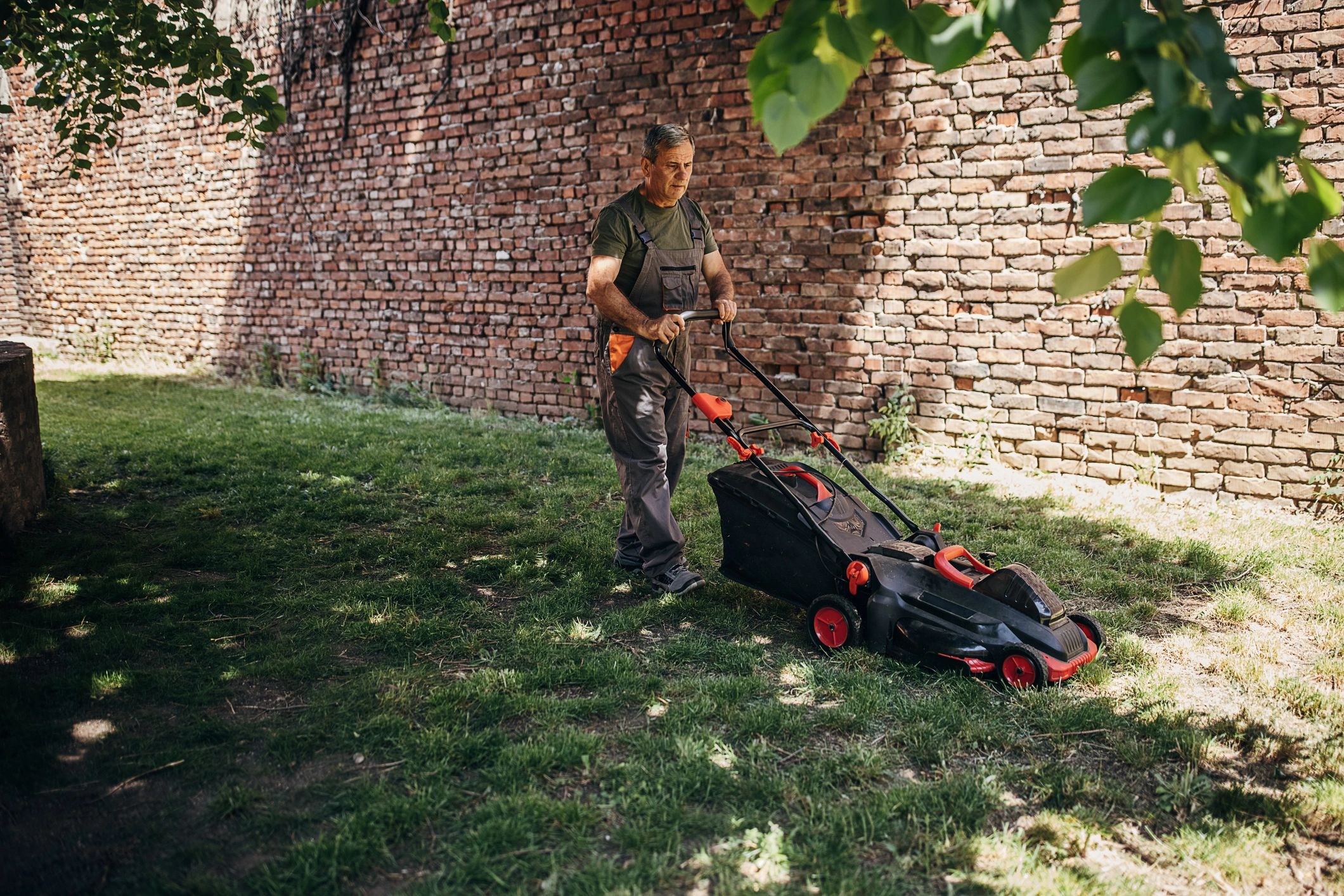 Homeowner working in a yard
