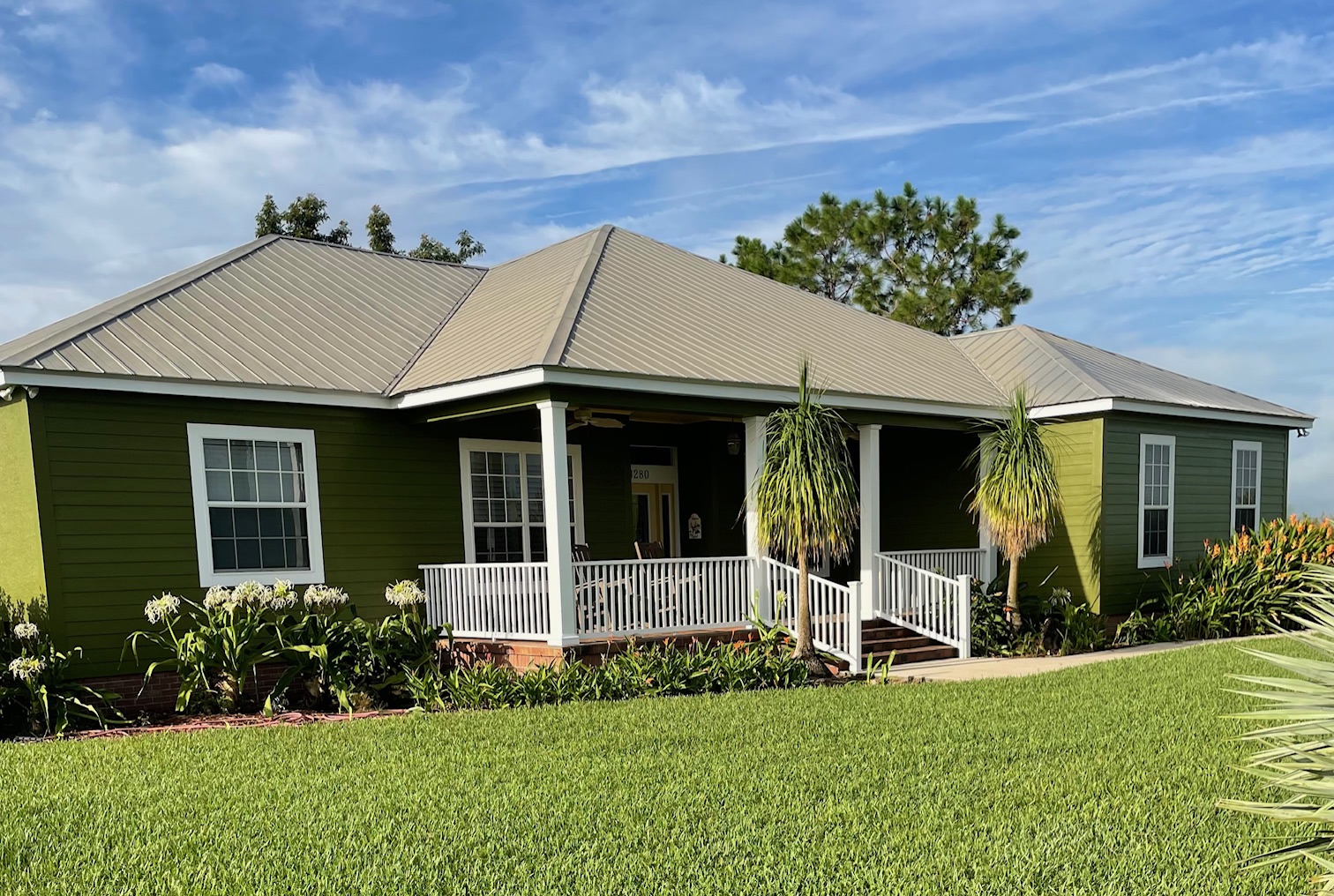 Green lawn and landscaping at a residential property